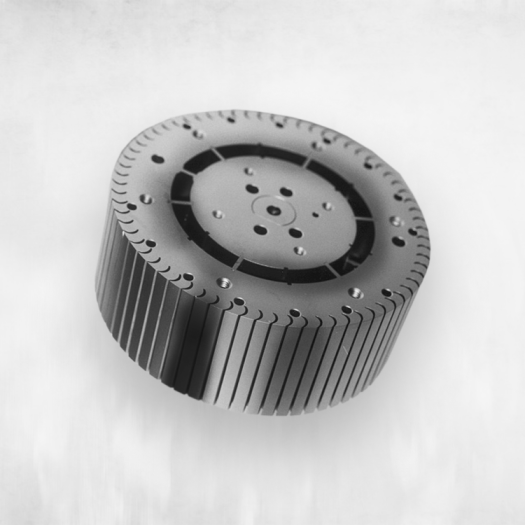A round metal part that shows signs of wear. 